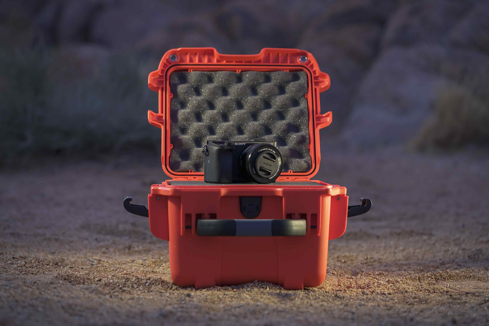 A NANUK 908 in Orange in the Desert