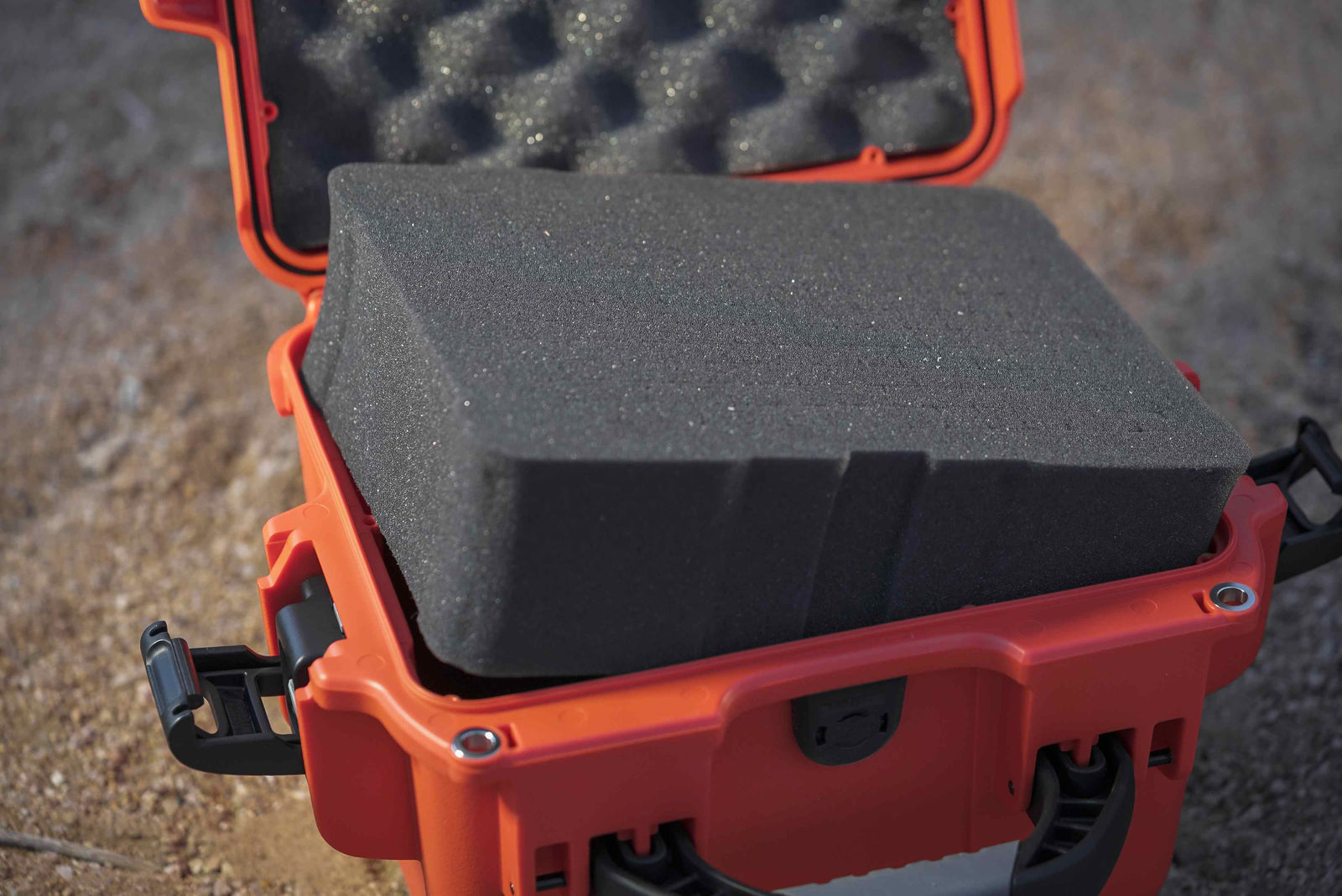 A NANUK 908 in Orange in the Desert