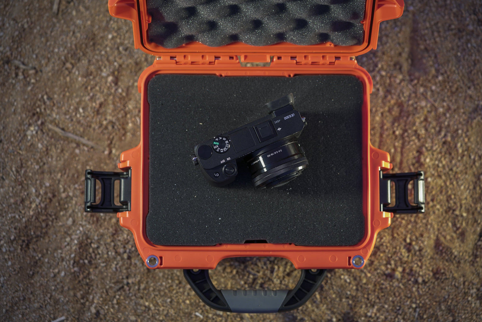 A NANUK 908 in Orange in the Desert