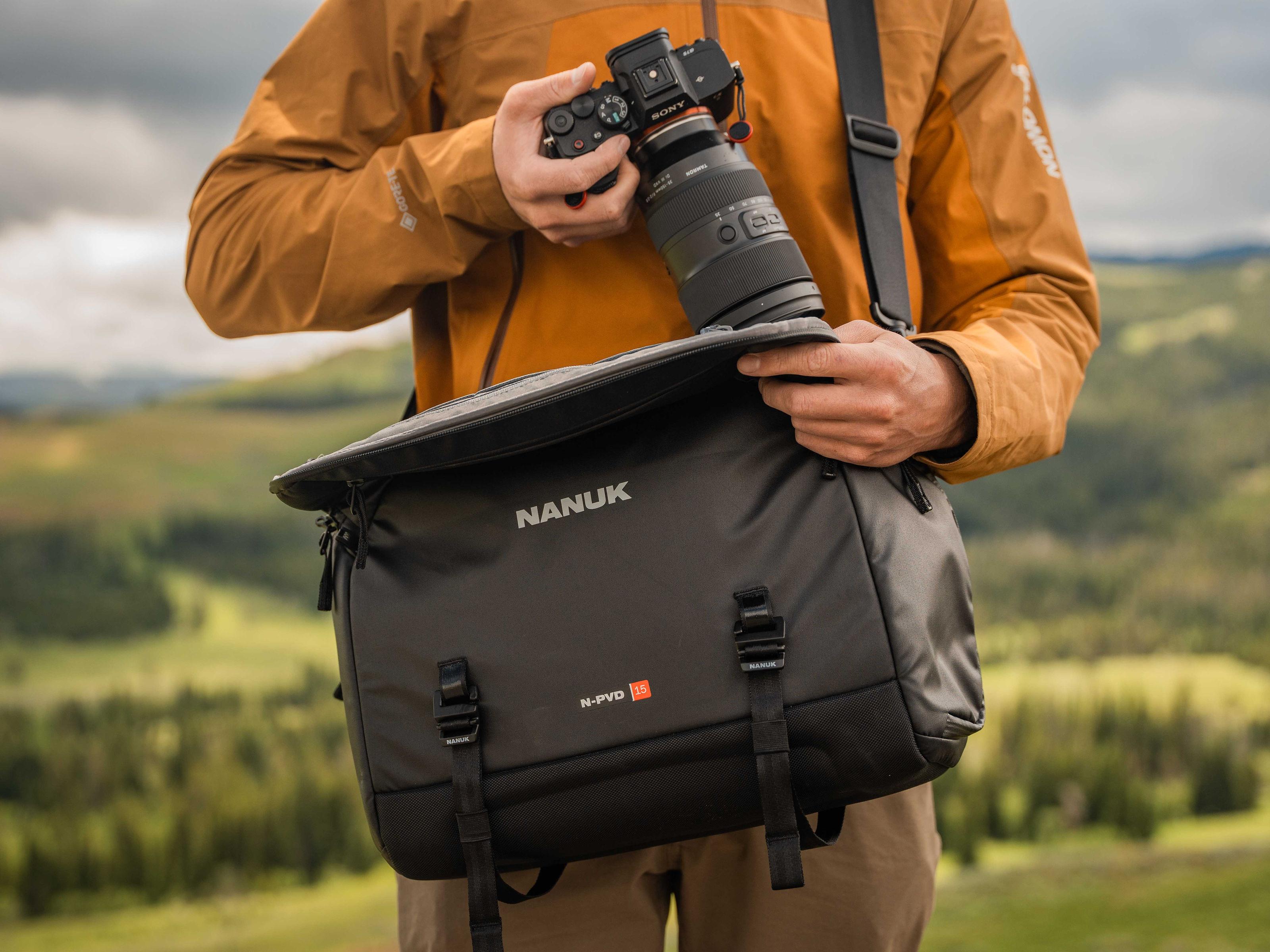 Photograph carrying the Nanuk 15L Messenger Bag with the strap