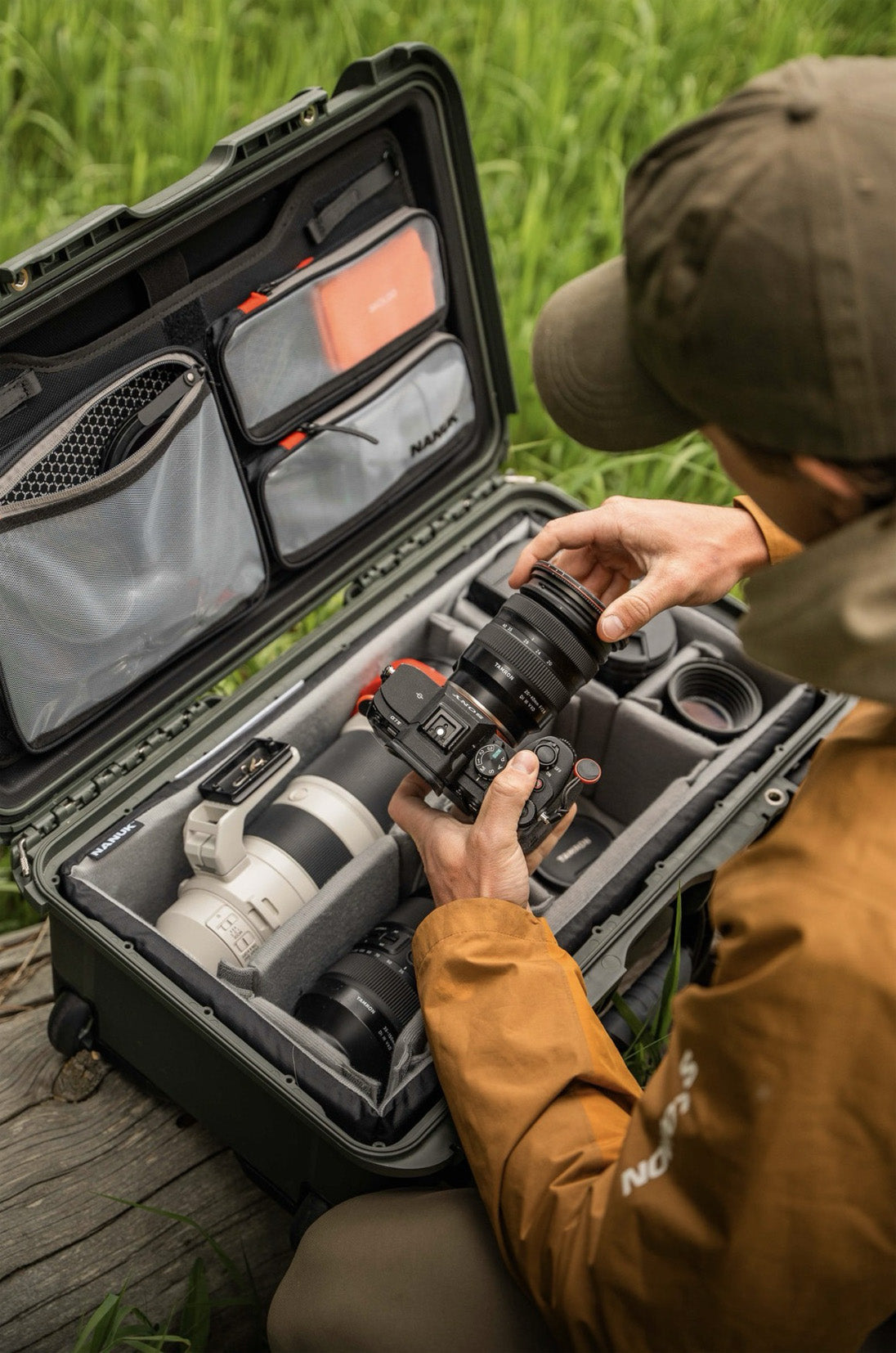 Professional Photographer looking into his NANUKL Pro Photo Kit Case